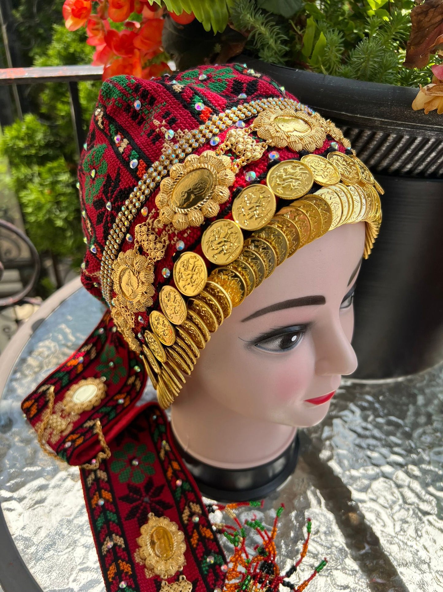 Waqaya with gold-plated coins